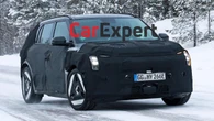 Kia’s new Seltos-sized electric SUV spied