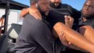 DJ Khaled gets security guards to CARRY HIM to stage to avoid getting sneakers dirty