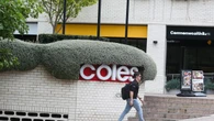 ASX edges higher as Coles, Woodside rally