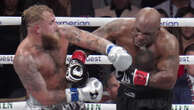 Tyson goes the distance, but loses in blockbuster bout