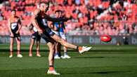 Giants crush road strugglers Suns in AFL finals push