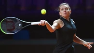 Champ Halep out of pre-Wimbledon warm-up