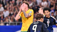 Late mistake costs Socceroos history-making Japan victory