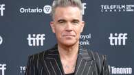 Robbie Williams admits to being 'introverted'