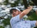 Oosthuizen edges Schwartzel in rain-delayed tournament