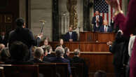 US politicians protest during Trump’s address to Congress