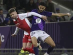 Defensive mix up helps Toulouse draw with Monaco