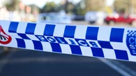 Police manhunt underway after teen stabbed