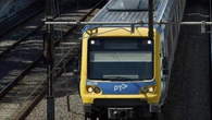 Man allegedly pushes woman onto train tracks