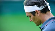 Federer beaten in pre-Wimbledon blow