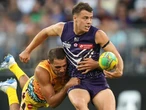 Simpson to be ‘a much better footballer’ for half-back stint