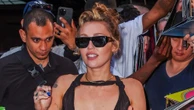 Miley Cyrus goes braless in completely sheer dress