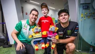 Supercar drivers make pitstop at hospital to race sick kids