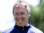 Players urge coaching legend to stay on