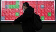 Asian shares fall, yen hits high amid US tariff worries