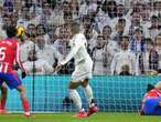 Real Madrid fight back for derby draw, retain lead