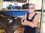 Couple clean up for a second time after flood disaster