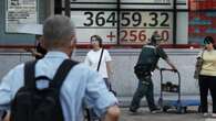 Asia shares bathed in Fed afterglow, yen jittery