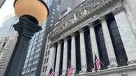 Wall St dips on weak sentiment data, while miners shine