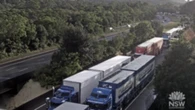 Truck spill strikes down hundreds of cars with punctures, causes 30km Sydney traffic jam