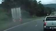 Moment beer truck flips on major motorway