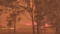 Fires rage on as perfect storm looms