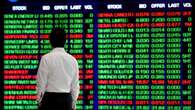 Aussies shares inch higher in holiday-shortened trading