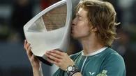 Fever-hit Rublev turns up the heat to win Madrid Open