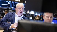 Wall Street mixed after Fed member's rate comments