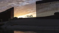 Trump's border wall tumbles under Biden