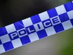 Man shot dead at front door in Canberra