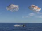 Splashdown: astronauts return after drawn-out mission