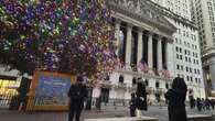 Wall St slides at end of strong holiday-shortened week