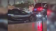 Put it in park! Unoccupied McLaren repeatedly rear-ends Maybach