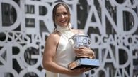 Swiatek plays down Wimbledon hopes after Paris triumph