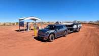 Family towing a caravan across Australia in an EV to prove ScoMo and doubters wrong