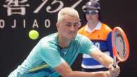 Tomic removed from stands, allegedly heckled rival