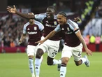Aston Villa beat Spurs to boost Champions League hopes