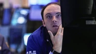 Wall Street slips amid focus on Trump's tax bill