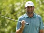 Scheffler moves to the top as PGA resumes after rain