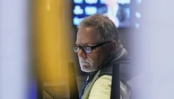 Wall Street slips ahead of Federal Reserve commentary