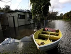 Evacuations, flood rescues as widespread rain continues