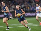 Smith shines as Cats survive Dogs' challenge in classic
