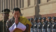 Mobile monarch calms Bhutan's COVID fears