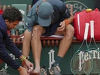Blistered 'clay dog' de Minaur scraps to Paris win