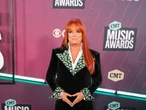 Wynonna Judd says touring immediately after her mom Naomi's suicide helped with her grief