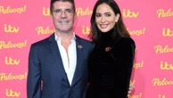 'We keep ourselves to ourselves': Simon Cowell and Lauren Silverman don't hang out with famous Cotswolds neighbours Posh and Becks