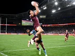 Coates floats high above To'o in Maroons aerial threat