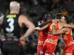 Suns shine under roof to extend club record AFL start