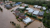 Flooded towns eye clean-up as new weather threat looms